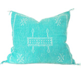 Turquoise pillow with white geometric patterns from Morocco, Berber design